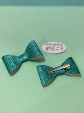 Load image into Gallery viewer, Glitter Blue Bow Clips - 2 Pack
