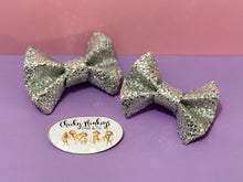 Load image into Gallery viewer, Glitter Silver Bow Clips - 2 Pack
