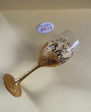 Load image into Gallery viewer, Hamilton “Raise a Glass” Wine Glass
